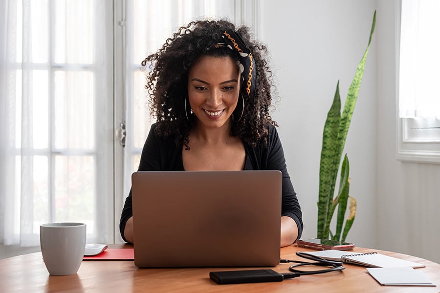 Young woman working with laptop